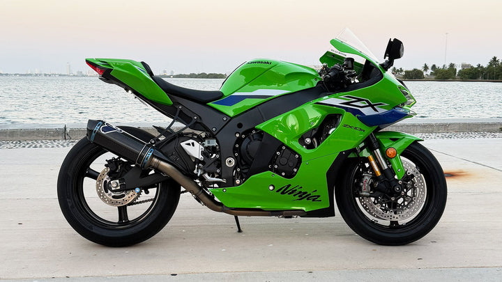 Motomillion 2026 Kawasaki ZX-10R build in Lime Green Ninja livery with carbon slip-on exhaust and Ohlins forks

